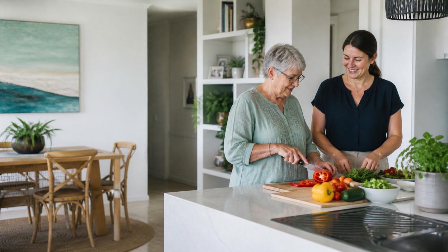Home care worker preparing a meal with an older person at home
